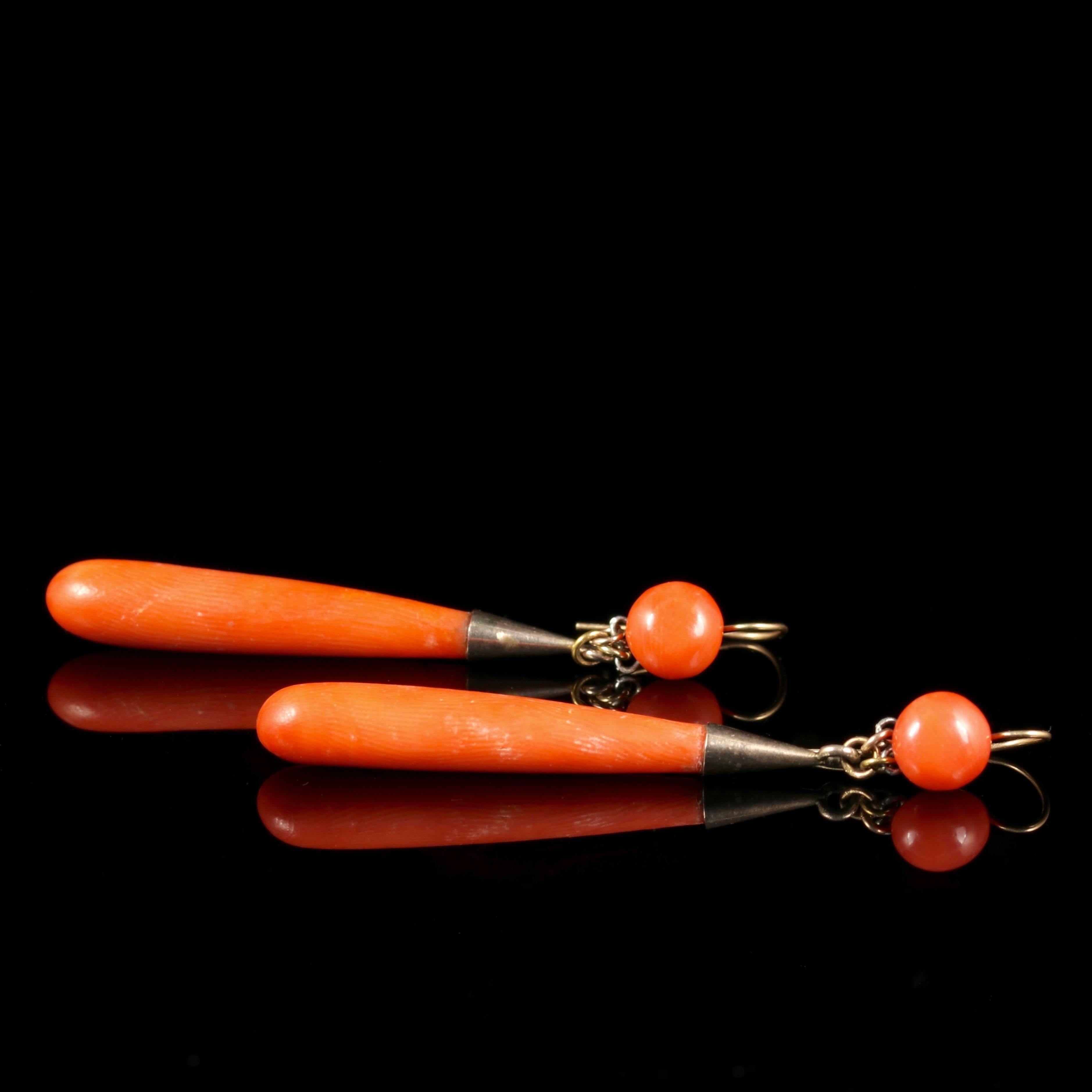These fabulous 18ct Gold Victorian long polished Coral earrings are exquisite.

Circa 1880.

The Coral drops are a deep natural orange and beautifully polished.

From the depths of the sea, comes the beautiful Coral which is produced by tiny life