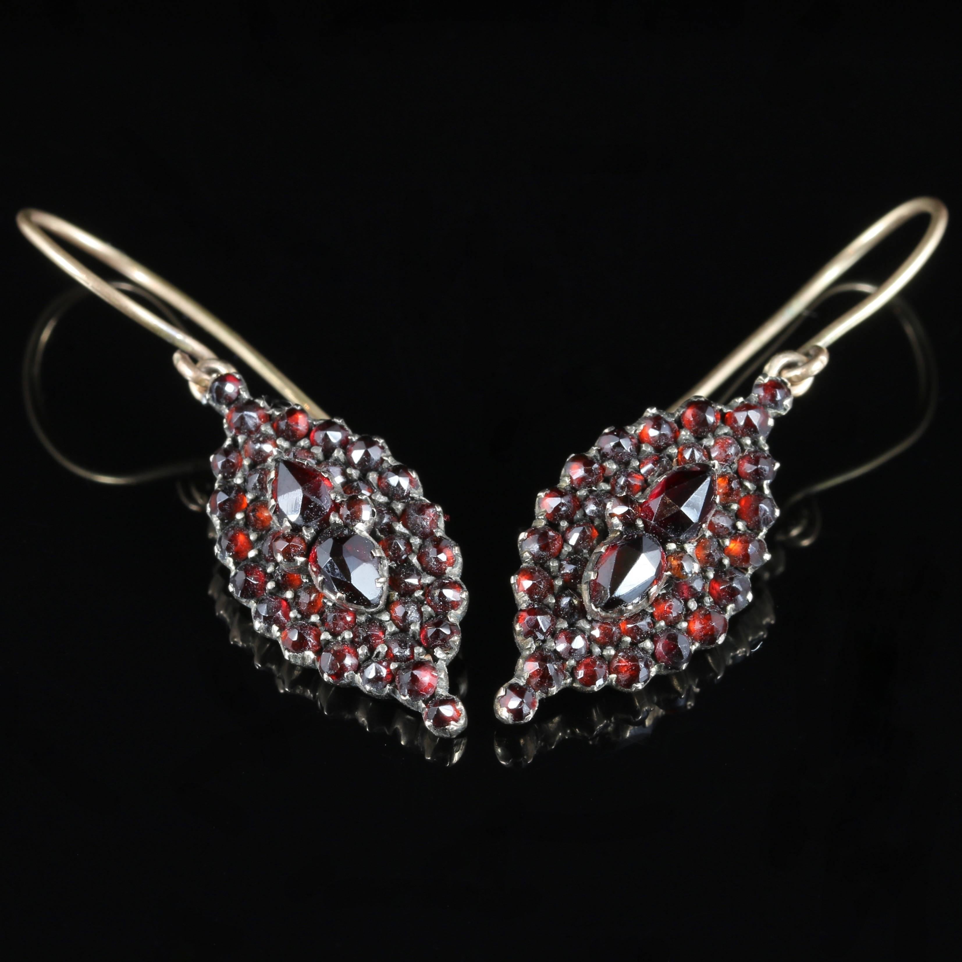 These fabulous Victorian marquise shaped deep red Garnet and Gold earrings are Circa 1900

Lovely deep red Garnets adorn these fabulous earrings.

The Garnet is a stone of purity and truth as well as a symbol of love and compassion. The Garnet will