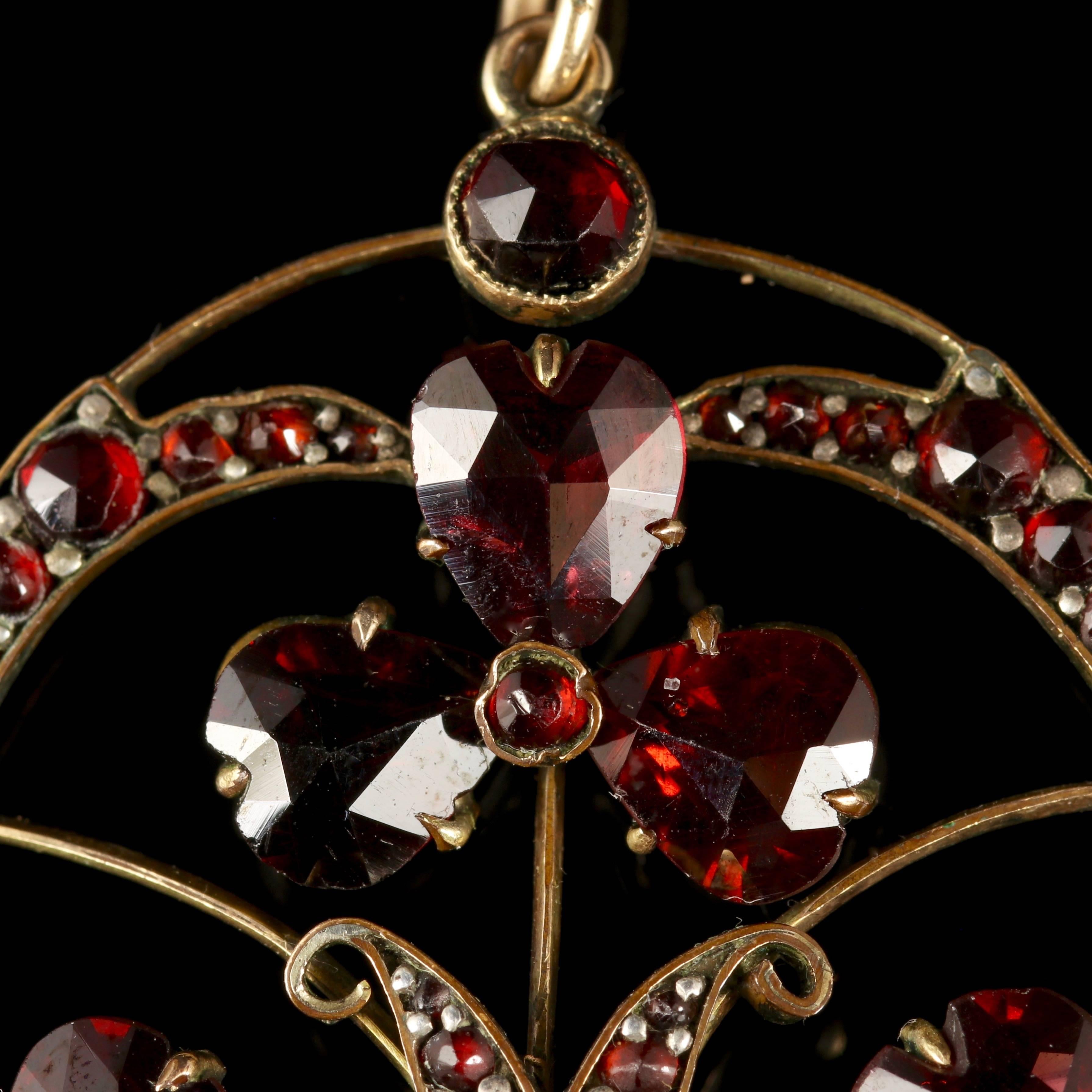 This genuine Victorian 9ct Gold Garnet pendant is fabulous.

A beautiful Victorian piece, circa 1880.

Set with old cut Garnets which are hand cut and polished as hearts in a three leaf clover shape which symbolises good luck.

The Garnet is a stone
