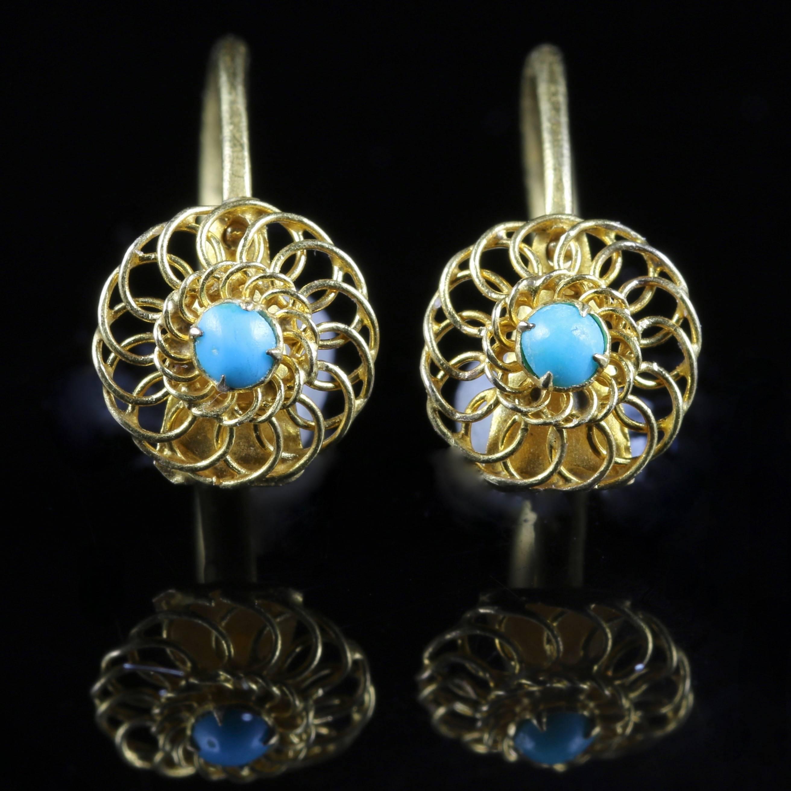 These fabulous 18ct Yellow Gold earrings are genuine Victorian Circa 1860, set with Turquoise stones and beautiful cannetille workmanship.

These gorgeous earrings can be worn night or day as the bottom earring detaches from the top, making these