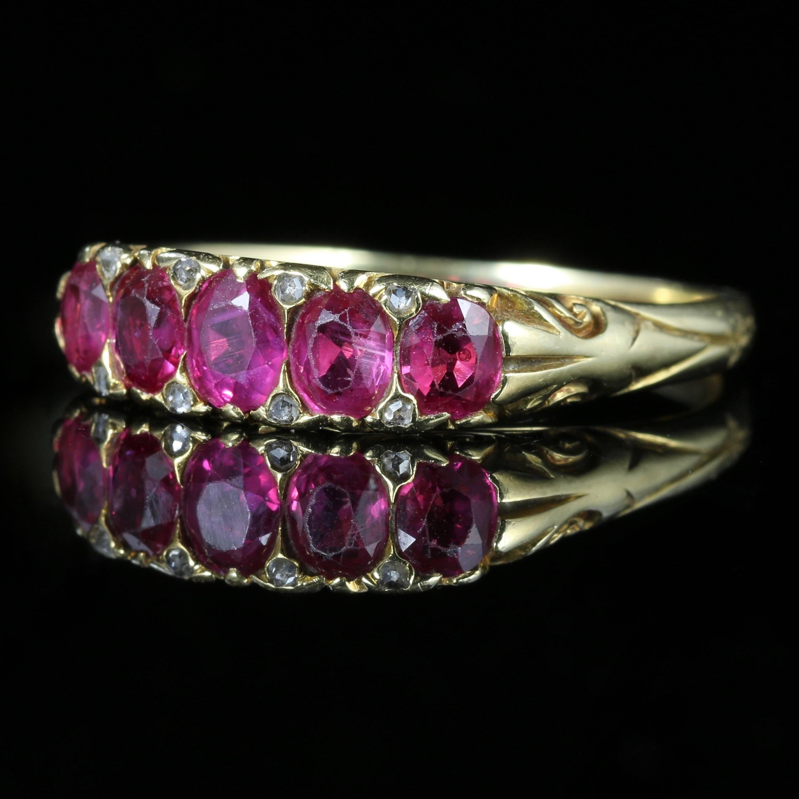 This beautiful Victorian ring is set with the most fabulous Burmese natural Rubies

Five beautiful rich pink Rubies are set across the central gallery with Diamonds nestled in between.

This ring has been certified and has been appraised as natural