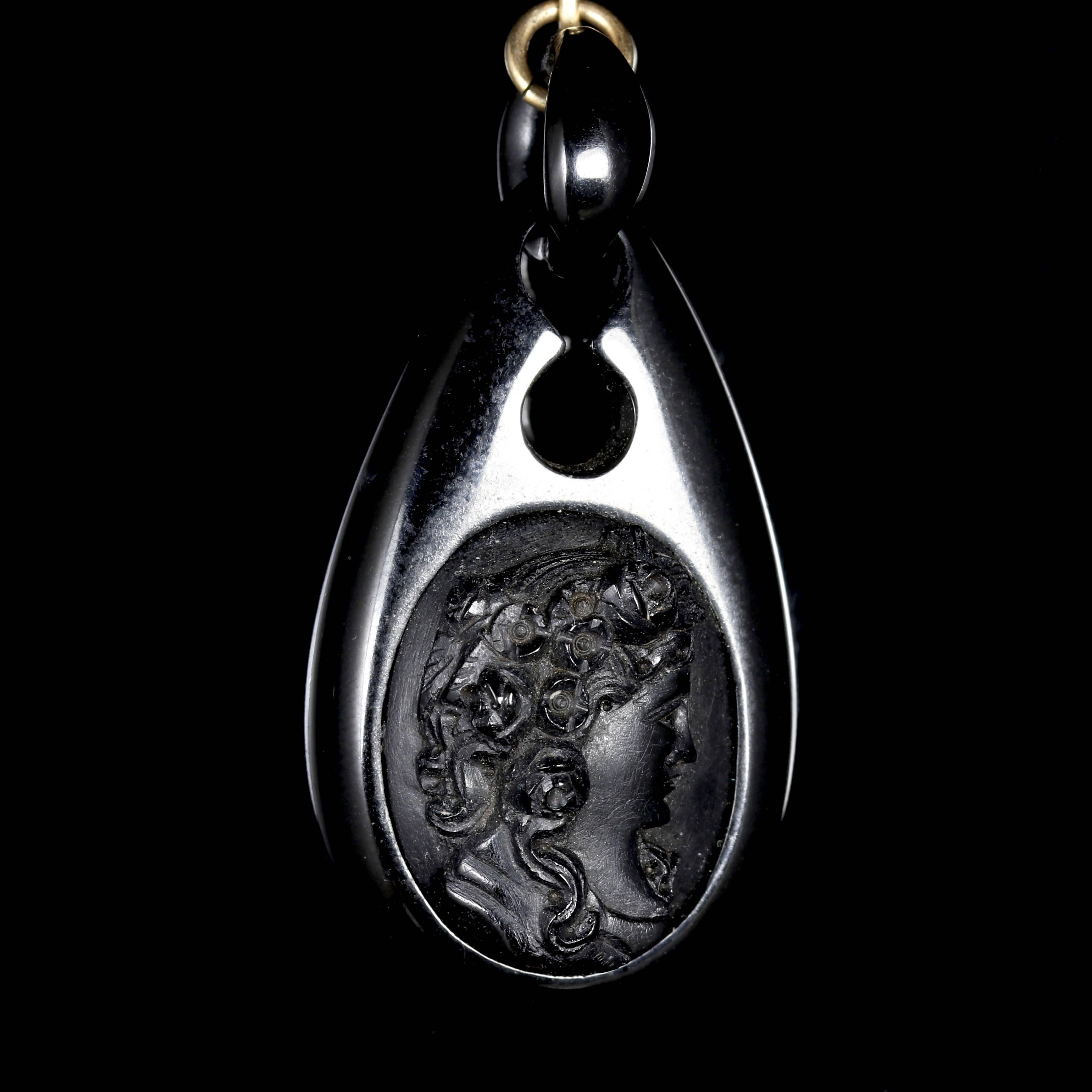 These magnificent long hand carved Victorian Cameo earrings are made from Whitby Jet from the 1880’s.

The earrings are set on gold wires.

These fabulous earrings depict beautiful hand carved Jet Cameos which are very well executed, a lovely fine