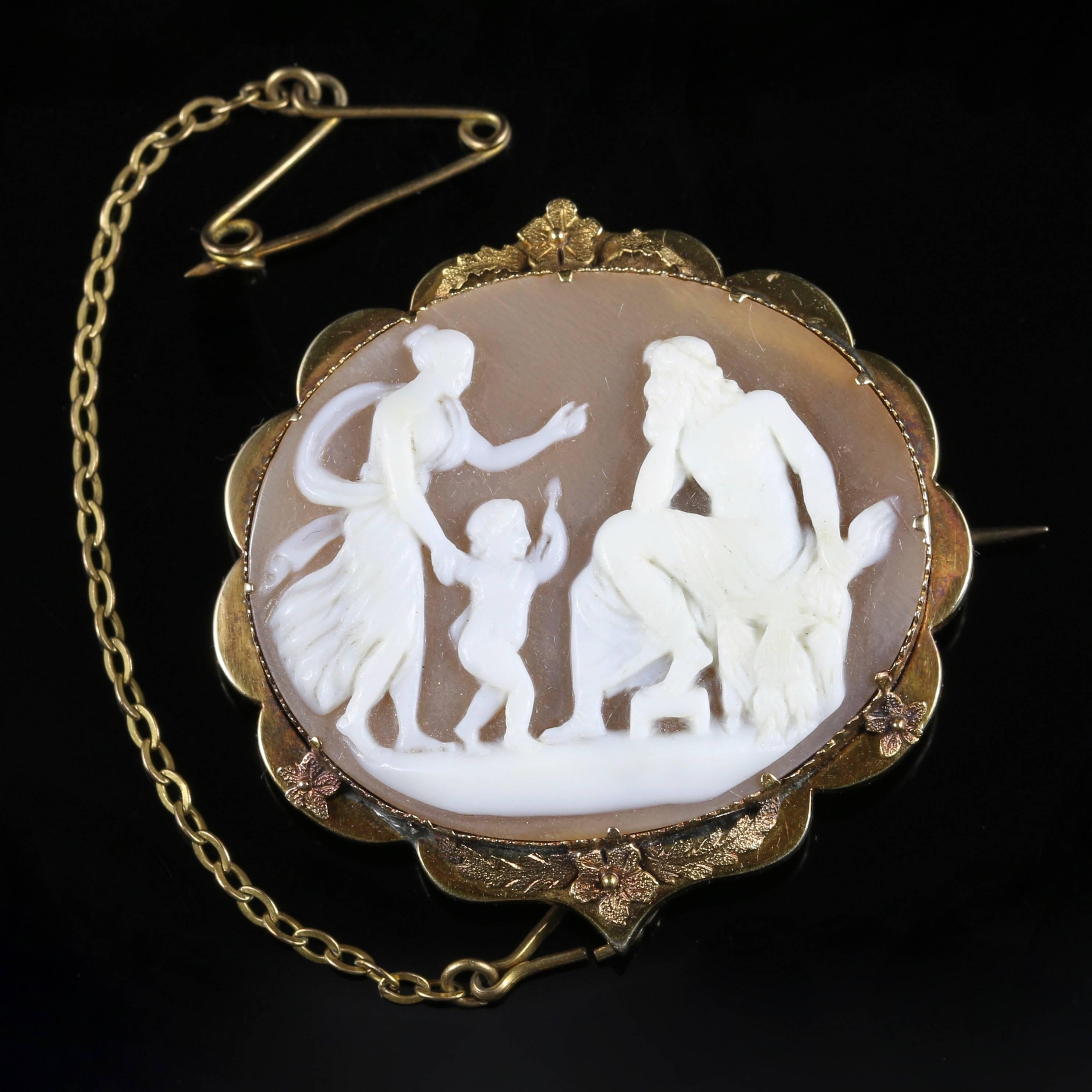 This is a fabulous Victorian cameo brooch in its original box, Circa 1900

The frame is set in 9ct Gold depicting pretty flowers, so lovely!

This brooch is hand carved from bull mouth shell, it is very well executed and has developed a lovely