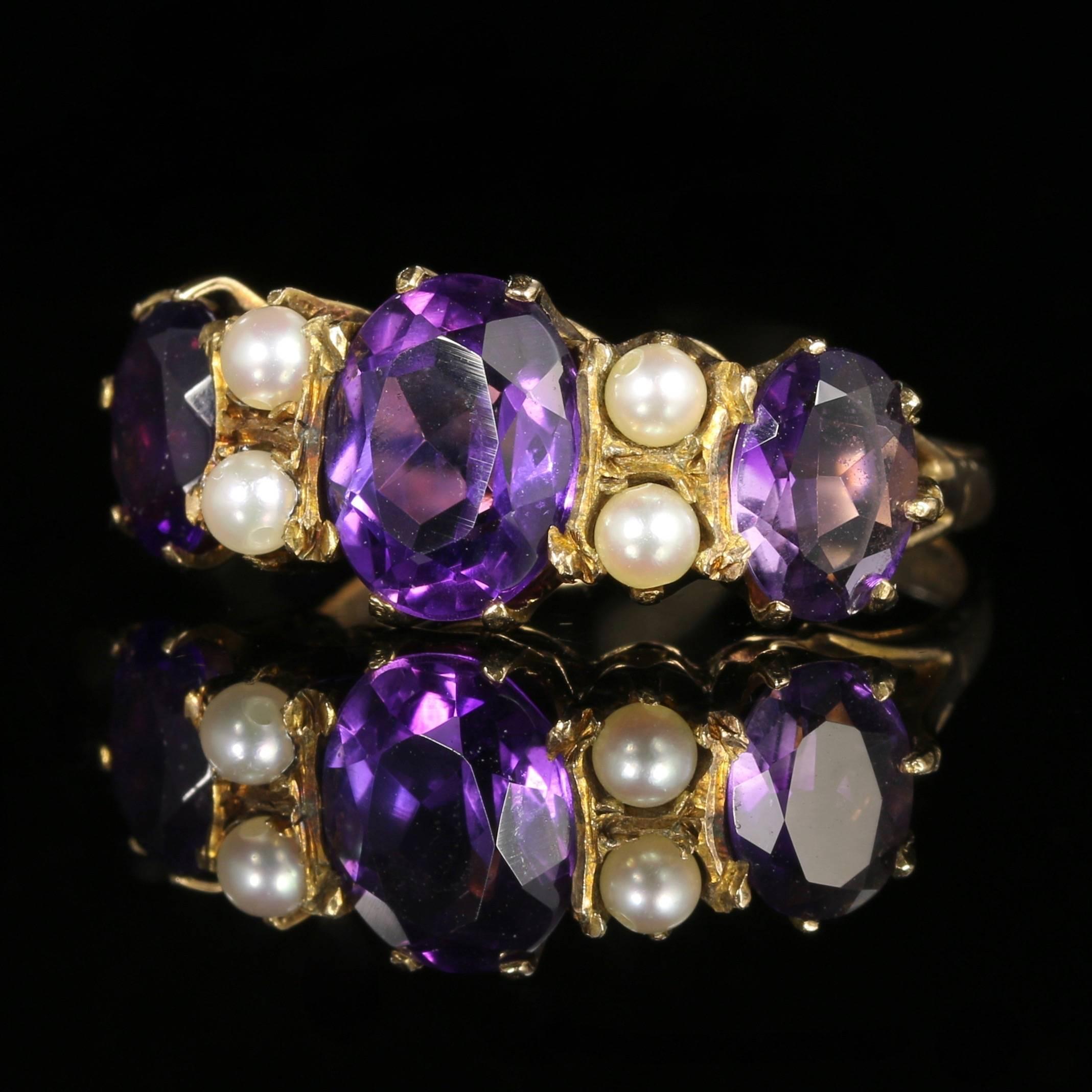 This fabulous 9ct Yellow Gold antique ring is set with beautiful rich purple Amethysts and lustrous Pearls.

Amethyst has been highly esteemed throughout the ages for its stunning beauty and legendary powers to stimulate, and soothe, the mind and