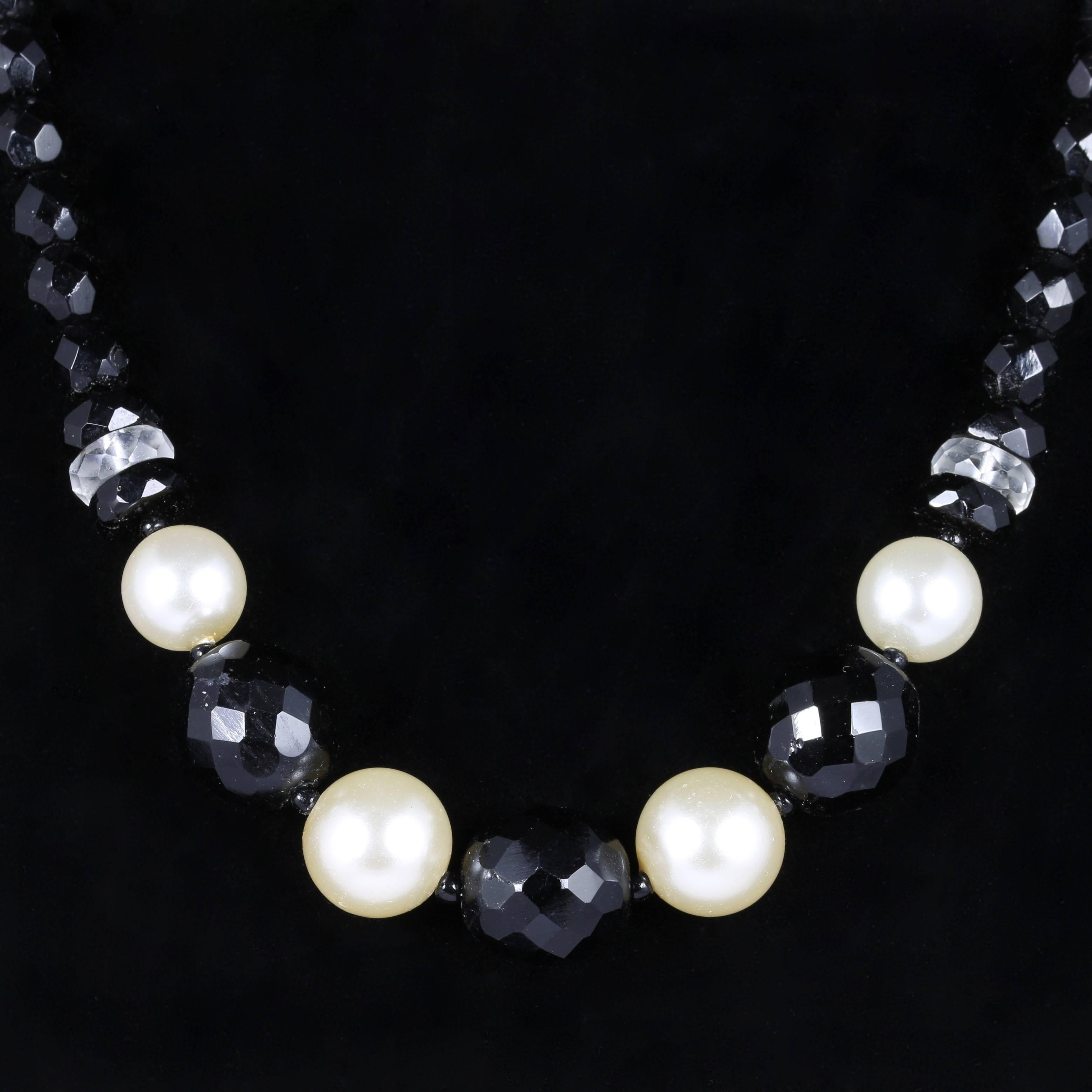This fabulous original French Jet and Faux Pearl Art Deco necklace is beautiful. Circa 1920

Each French Jet is hand cut and beautifully polished.

French Jet is highly collectable and has a beautiful facet that catches the light. 

French Jet beads