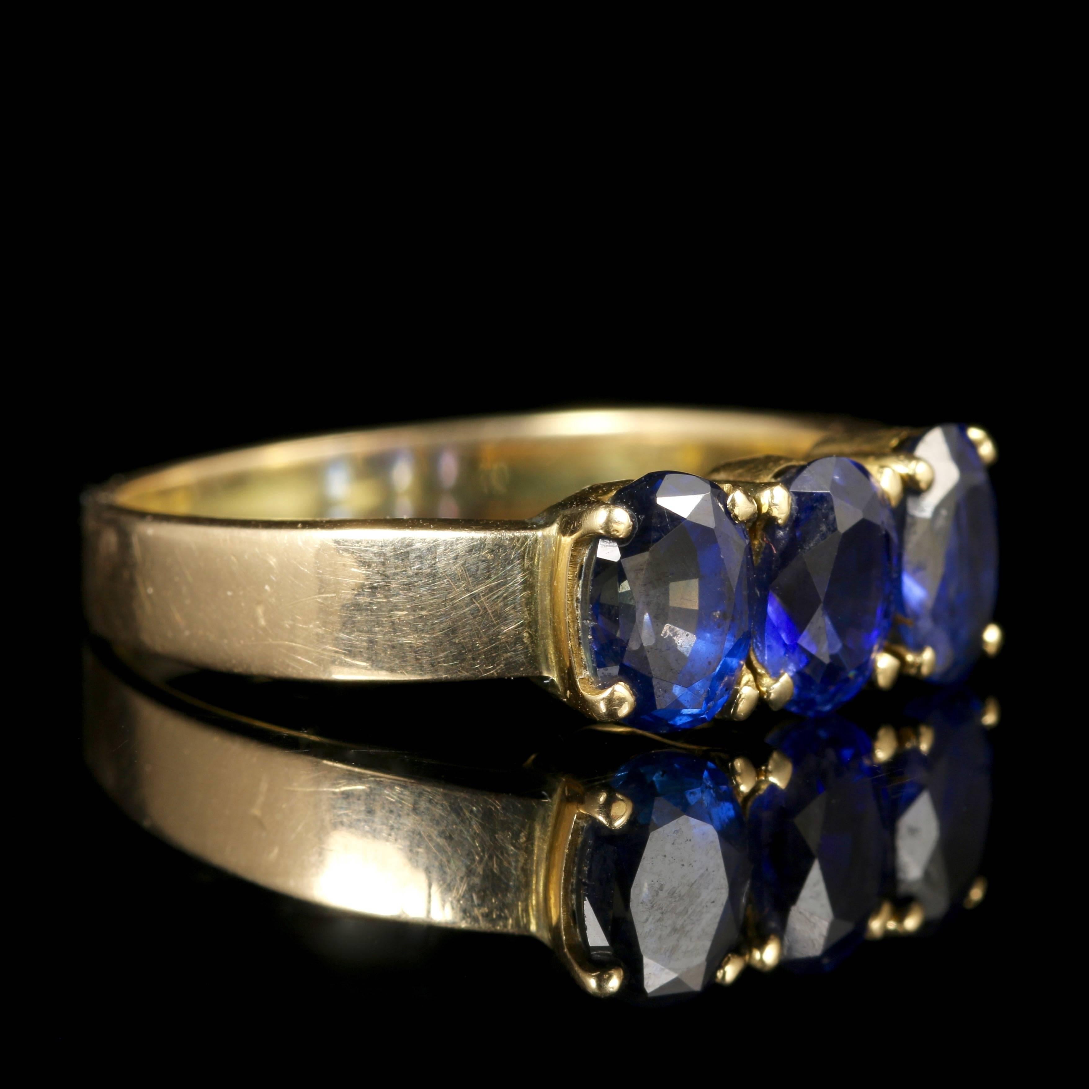 This fabulous Victorian trilogy ring boasts stunning rich Blue Sapphires all set in 18ct Yellow Gold.

A trilogy of Blue Sapphires sits across the centre of the ring complimenting the 18ct Yellow Gold. 

Trilogy stands for past, present and future,