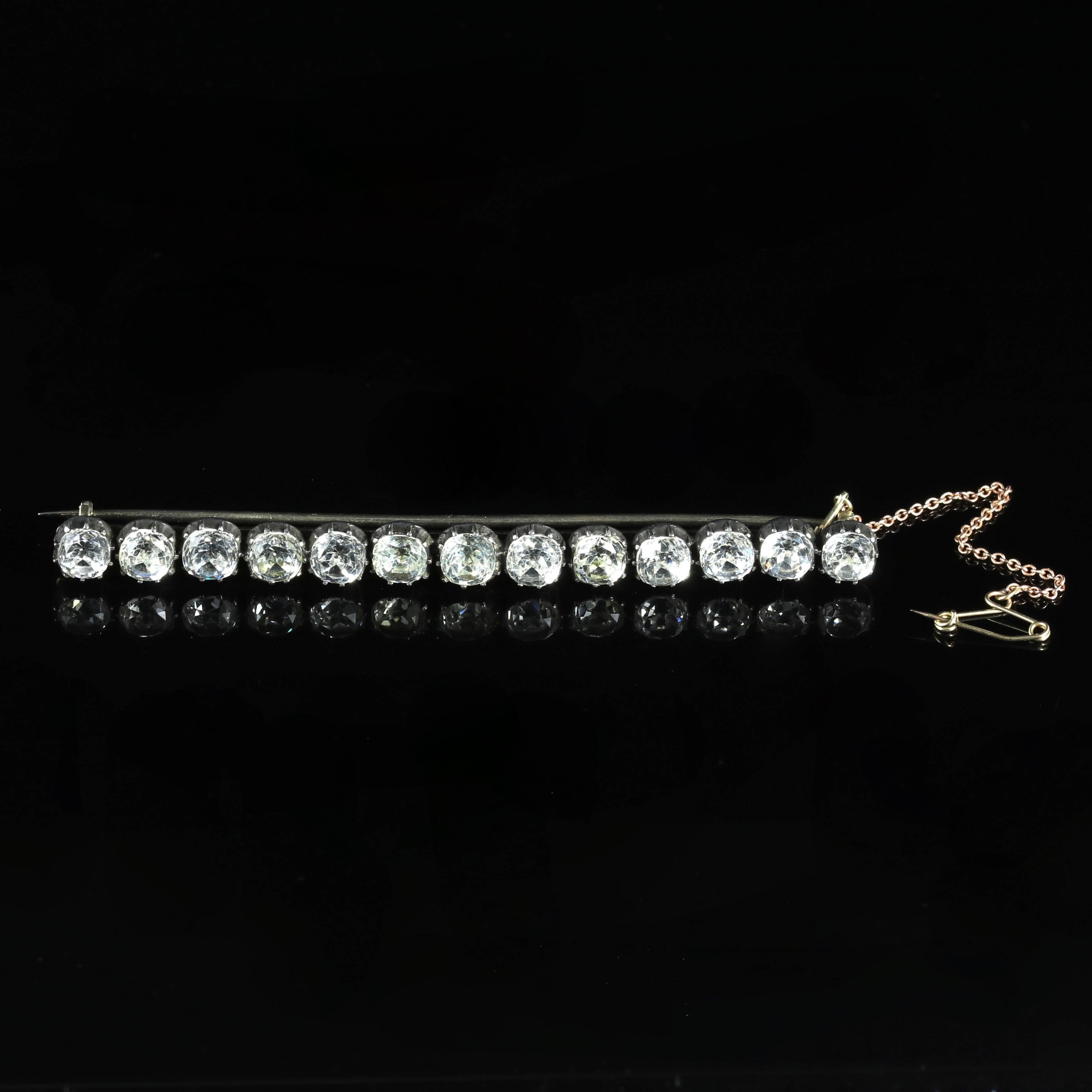 This exquisite fabulous long Sterling Sliver brooch is adorned with large old cut Paste Stones.

13 fabulous old cut Paste Stones are set into this amazing Georgian brooch.

Paste is a heavy, very transparent flint glass that stimulates the fire and