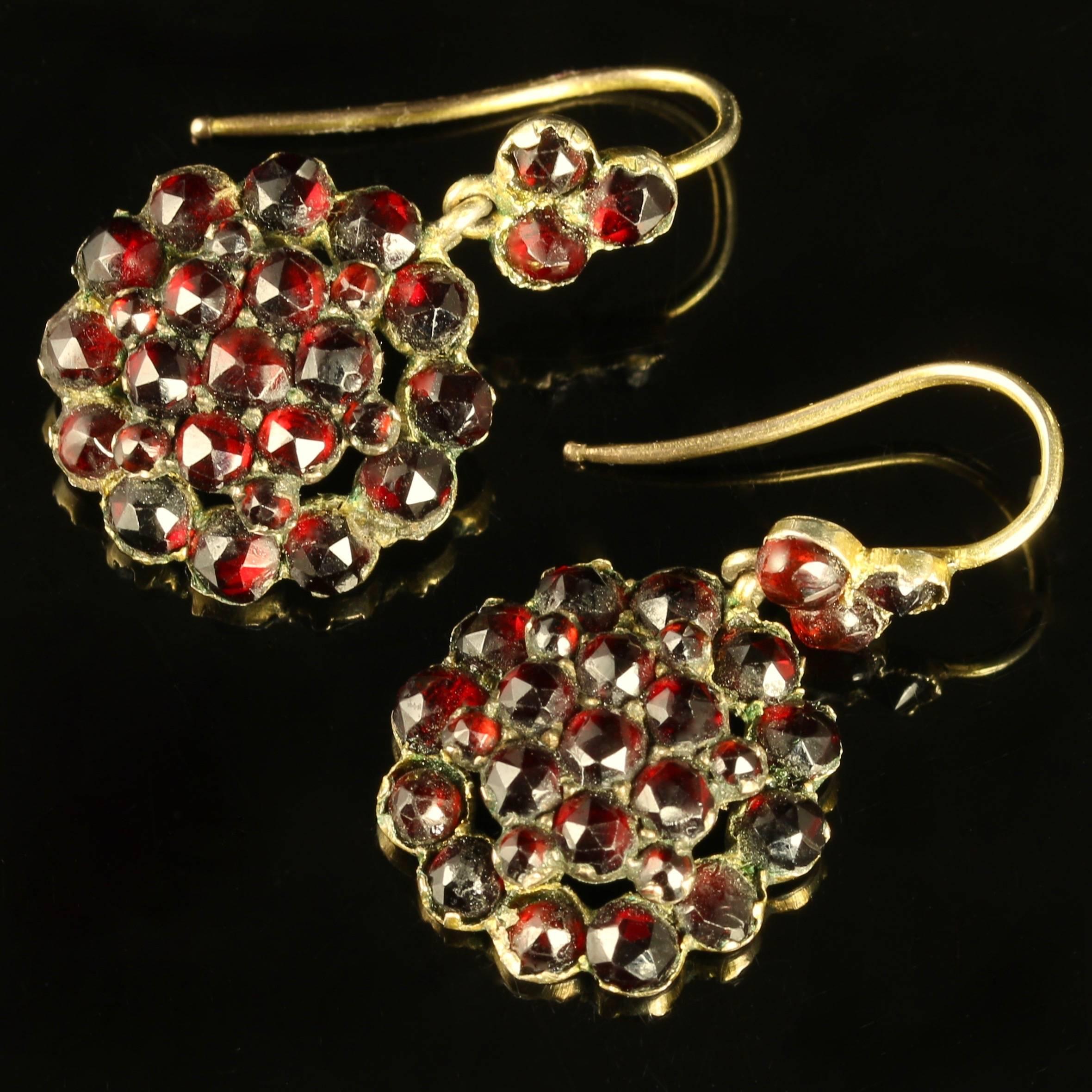 These stunning Bohemian Garnet earrings are circa 1880.

A fabulous pair of earrings which are set on 18ct Gold wires.

Beautiful rich faceted deep Red Garnets adorn these beautiful earrings.

The Garnet is a stone of purity and truth as well as a
