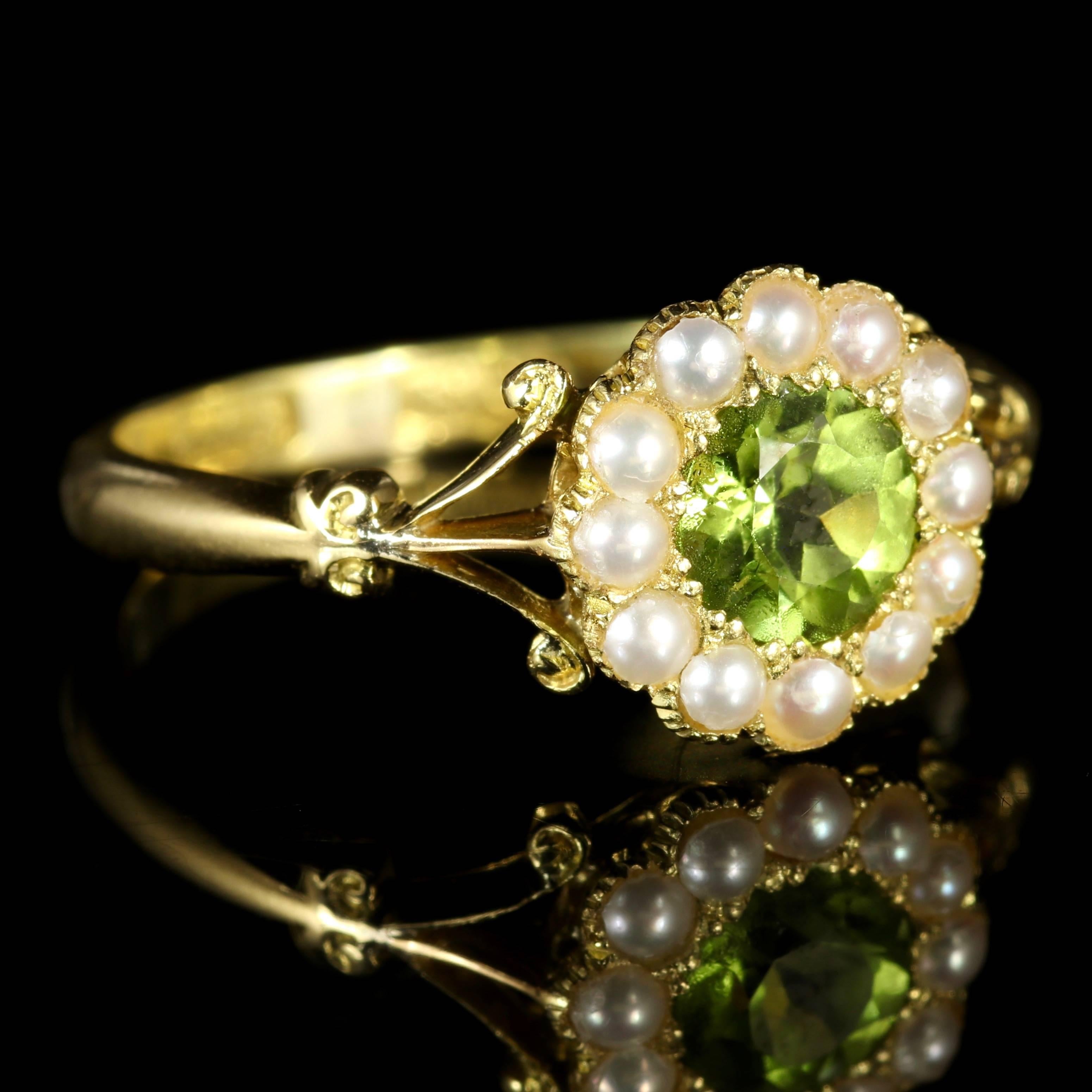To read more please click continue reading below...

This genuine Victorian 18ct Yellow Gold ring is adorned with a rich olive green Peridot and lustrous Pearls.

The Peridot is a stone of lightness and beauty and was believed to be a stone of