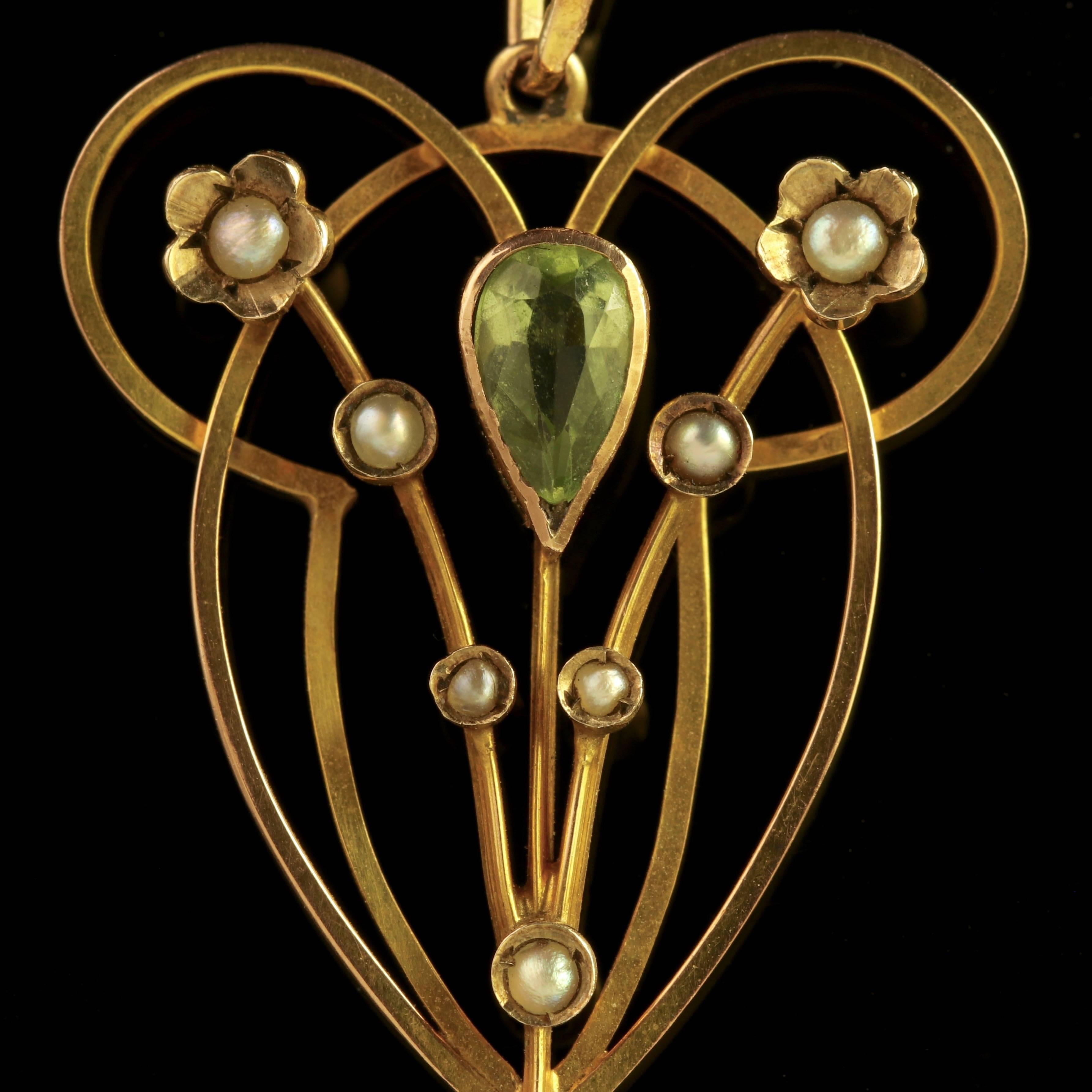 To read more please click continue reading below-

This fabulous antique 9ct Yellow Gold pendant is genuine Victorian Circa 1900. 

The wonderful floral pendant is adorned with two rich green Peridots and decorated in lovely Pearls. 

The Peridot is