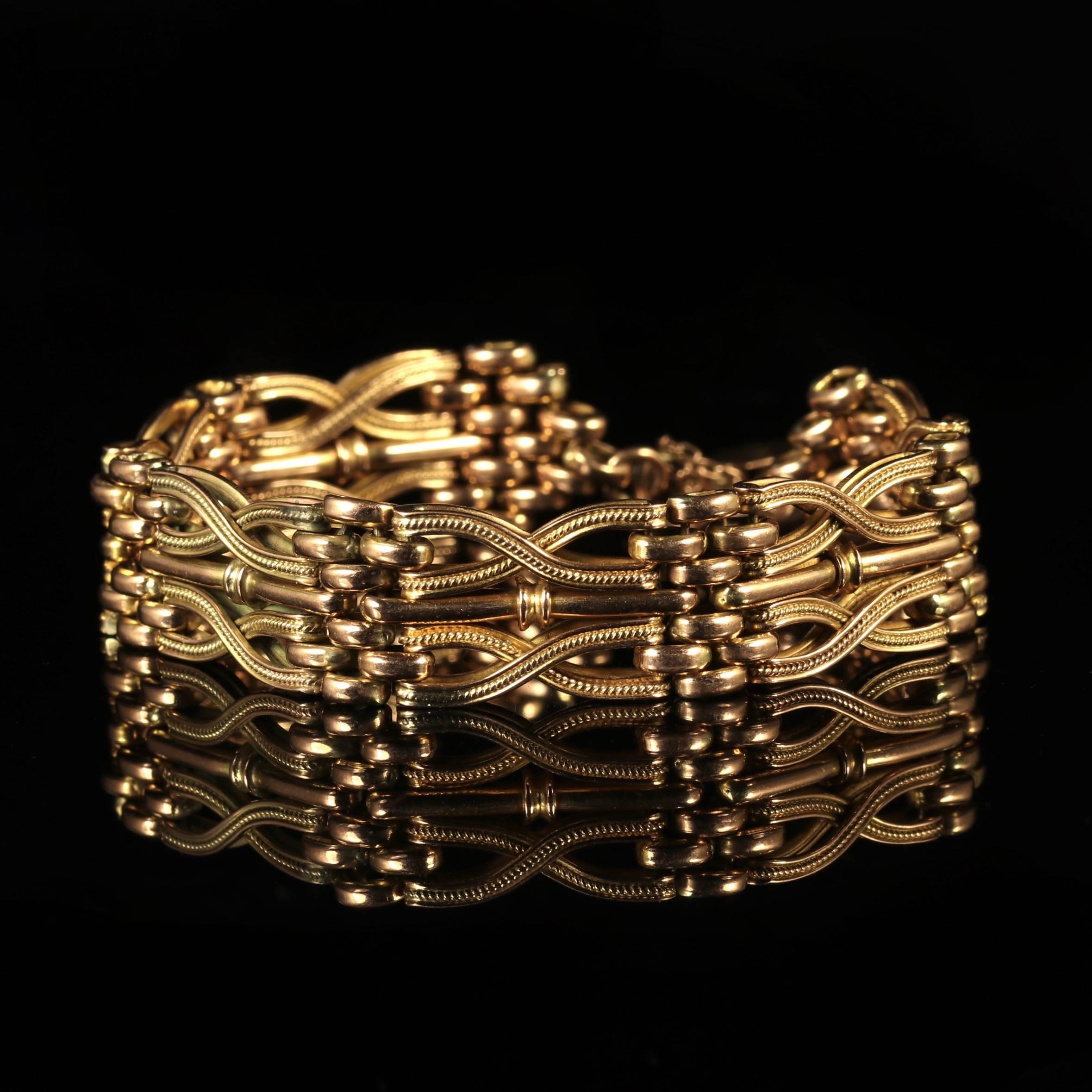 This genuine 9ct solid Gold gate bracelet has a fancy central Gold panel which displays beautiful workmanship throughout.

Commissioned in 9ct Gold which has turned a lovely rosy hue with age.

One of the nicest gate bracelets we have ever exhibited
