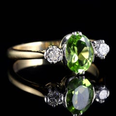 Antique Victorian Peridot Diamond Trilogy Ring, circa 1900