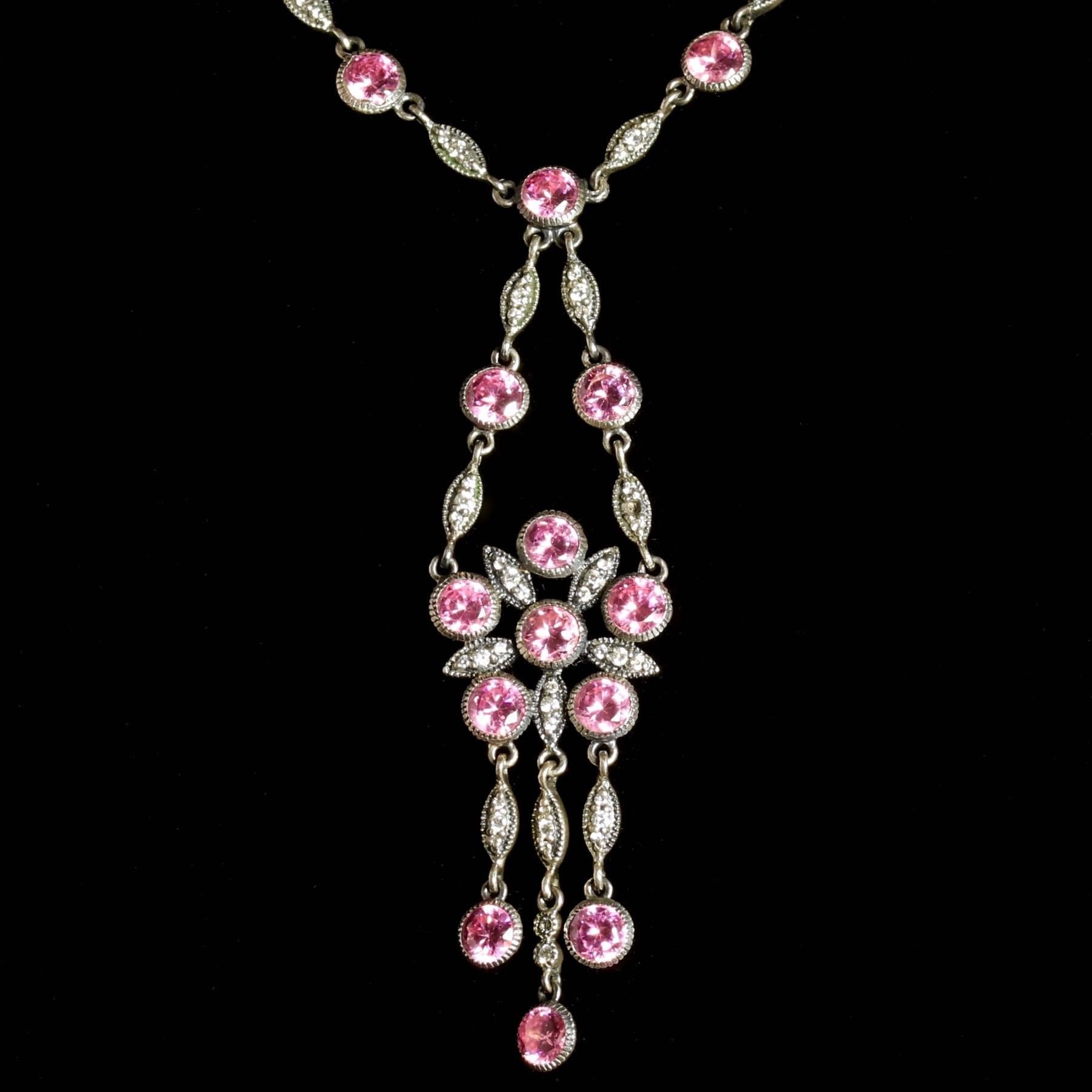 This fabulous Sterling Silver Victorian Paste pendant necklace is Circa 1900.

Lovely old cut Paste stones adorn this fabulous necklace, featuring lovely Pink Pastes and also White which sparkle just like Diamonds.

Paste is hand-cut glass that has