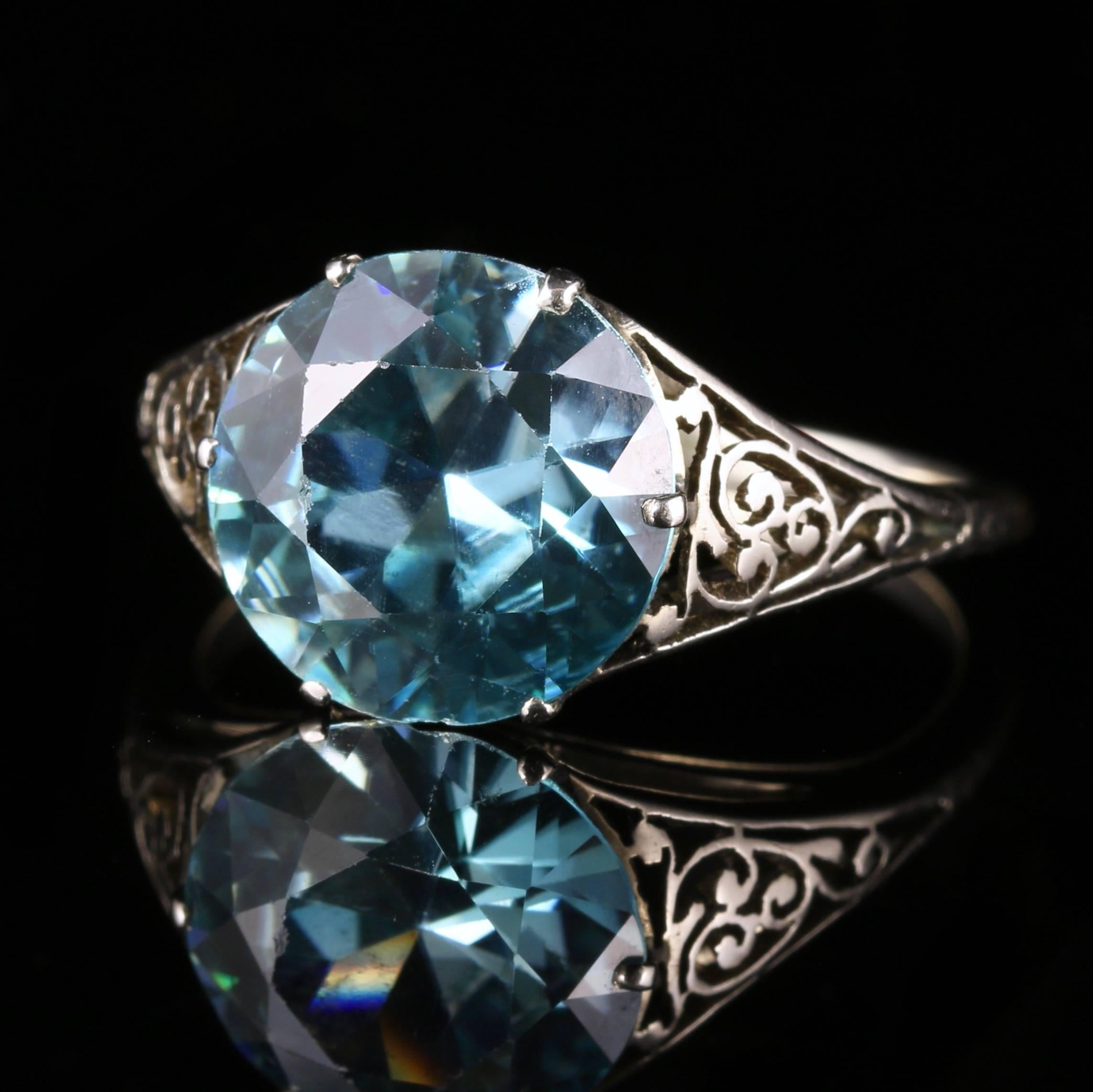 For more details please click continue reading down below...

This fabulous Edwardian ring boasts a 4ct Blue Zircon all set in Platinum Circa 1915

Beautiful ornate shoulder decoration in Platinum also compliments the ring.

Blue Zircon is the birth