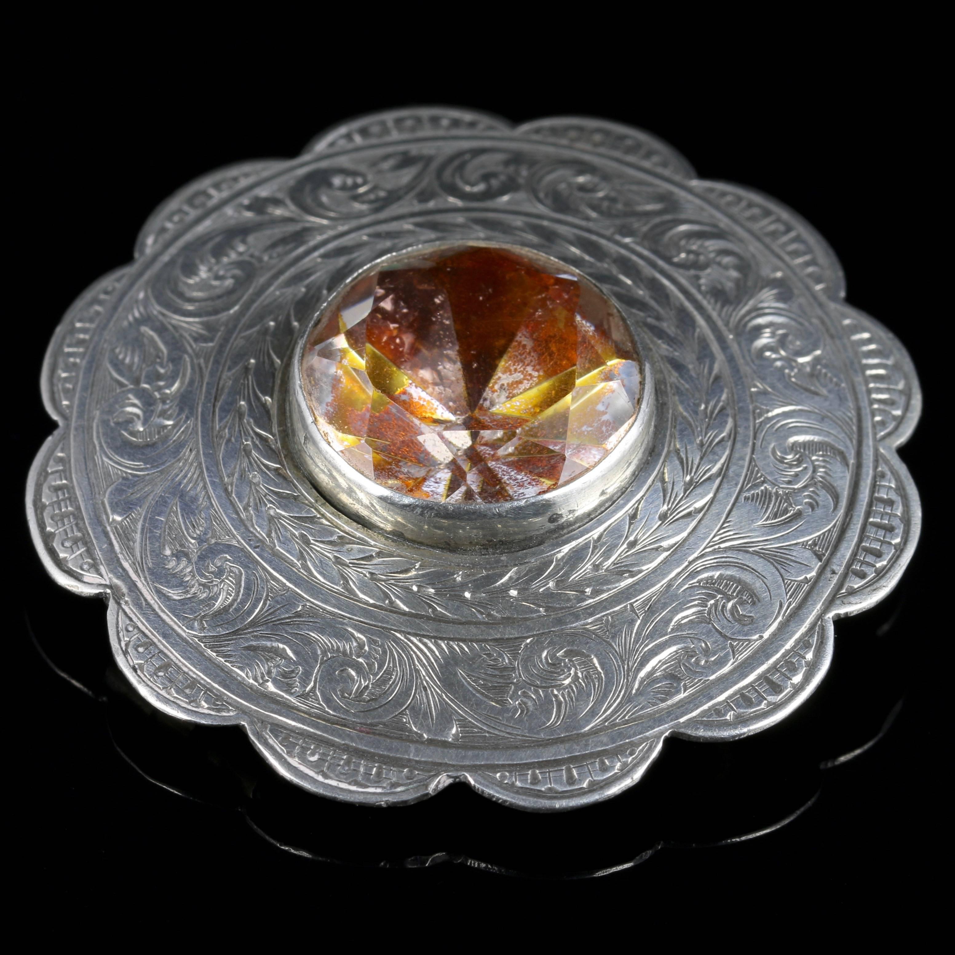For more details please click continue reading down below...

This fabulous Sterling Silver Scottish Citrine brooch is Circa 1860.

Set with a large natural tested Citrine in the centre approx 12ct in size.

The name Citrine is derived from the