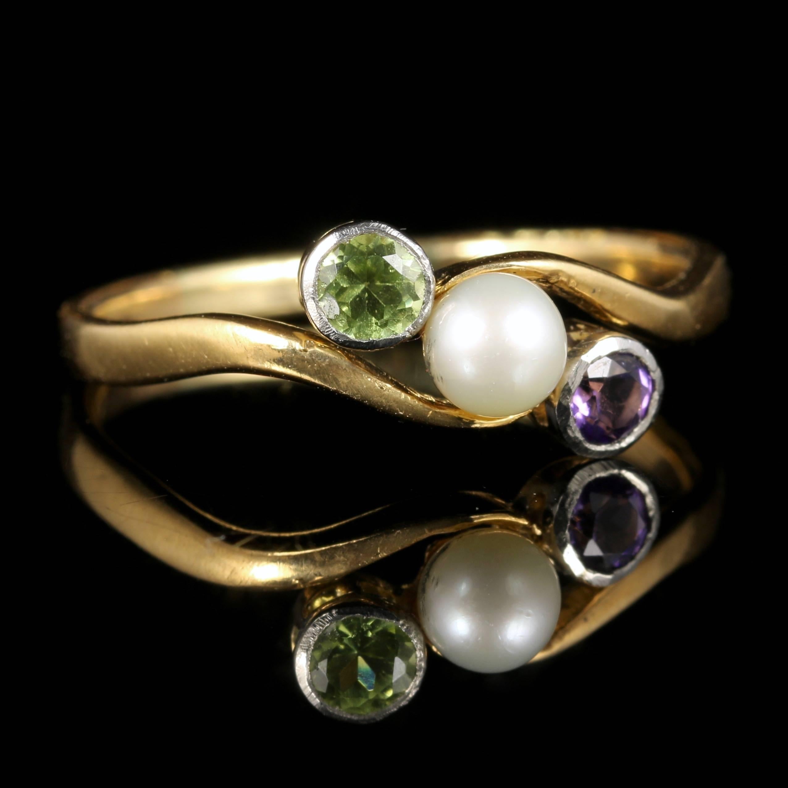 For more details please click continue reading down below...

This fabulous genuine Antique Victorian suffragette ring is set in 18ct Gold.

Circa 1900

Set with a central Pearl and an Amethyst and Peridot either side.

The trilogy of gemstones sit