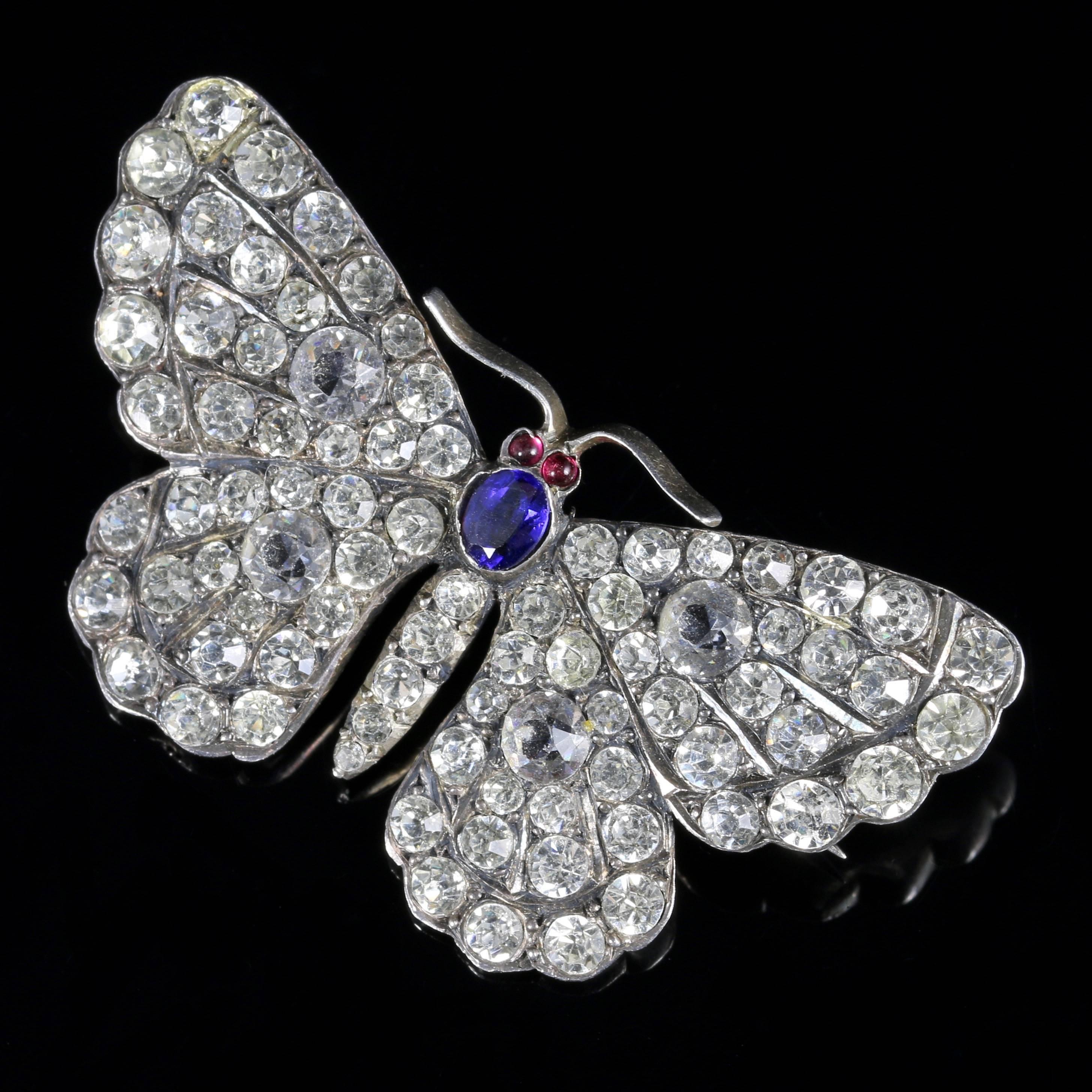 For more details please click continue reading down below...

This fabulous sterling Silver butterfly brooch is set with Paste, Tanzanite and Garnet stones. 

Circa 1900

This spectacular butterfly is set with Garnet eyes.

The blue stone tests as a