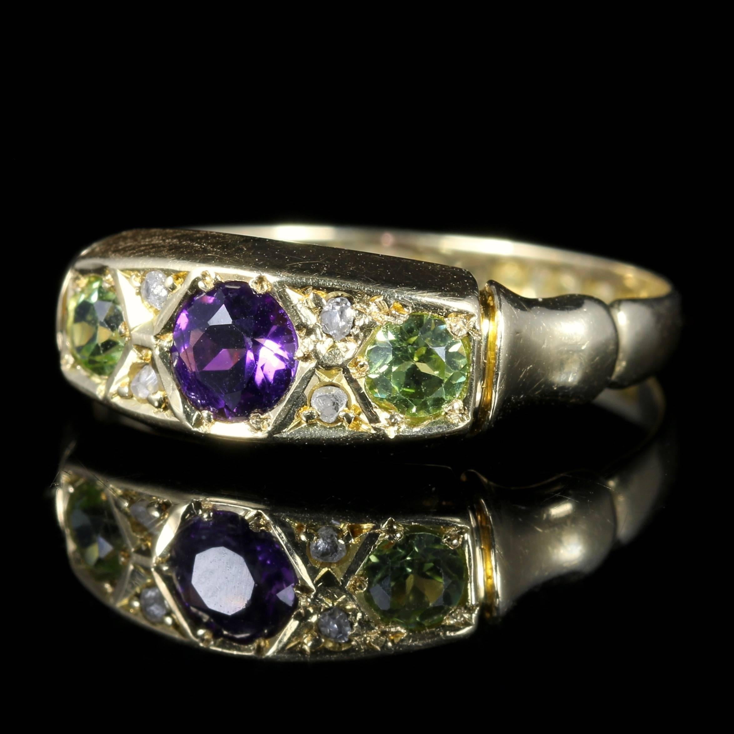 For more details please click continue reading down below...

This stunning antique Suffragette ring is set in 18ct Gold, set with Amethyst Peridots and Diamonds.

This ring is genuine old, hallmarked Birmingham 1902 and 18ct.

Emmeline Pankhurst
