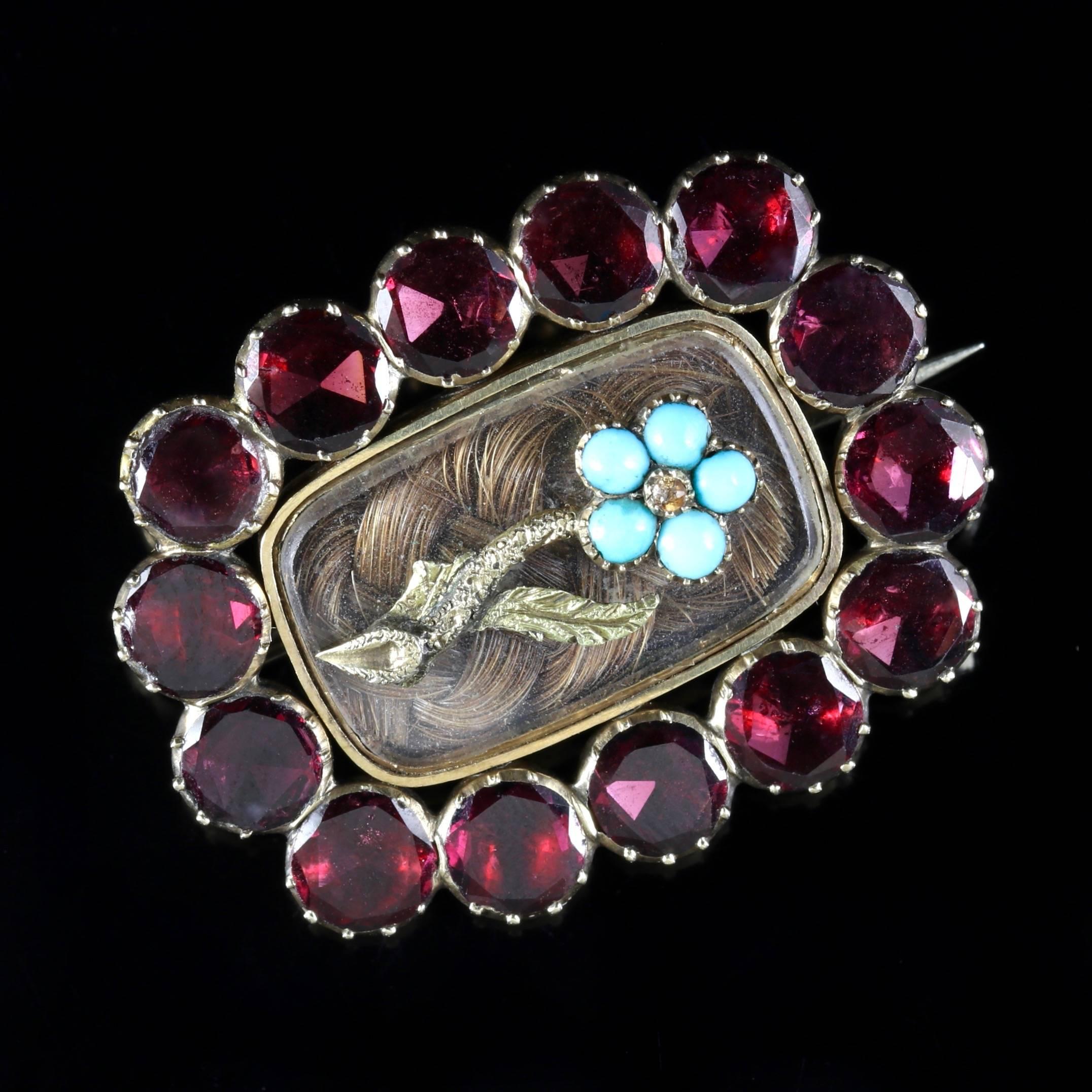 This antique Georgian Flat cut Garnet mourning 18ct Gold brooch is Circa 1790.

Due to its age, Georgian jewellery is quite rare, with some pieces almost three hundred years old. From 1714 until 1837 four King Georges and a short-lived William gave