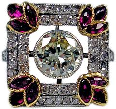 1900s Austria Art Nouveau 1.25 Carats Diamonds Rubies Silver Gold Cluster Ring