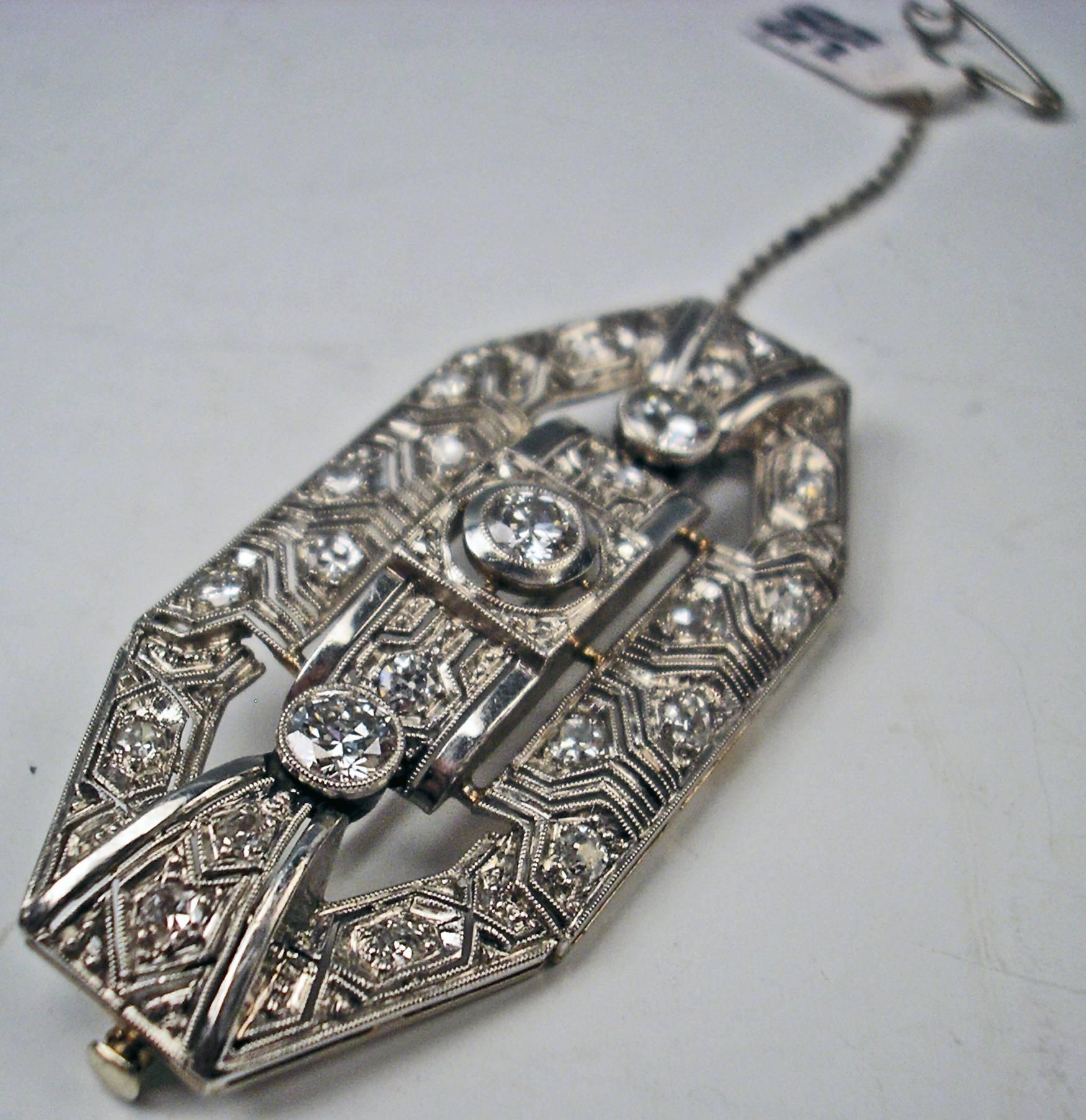 Finest Art Deco Platinum Brooch with many DIAMONDS - vintage cuts, having 2,10 carat in total. Most elegant octagonal - i.e. geometric -  as well as reticulated form type !

Closure of secure type existing.

made of PLATINUM  / 950 ct.
Vienna,