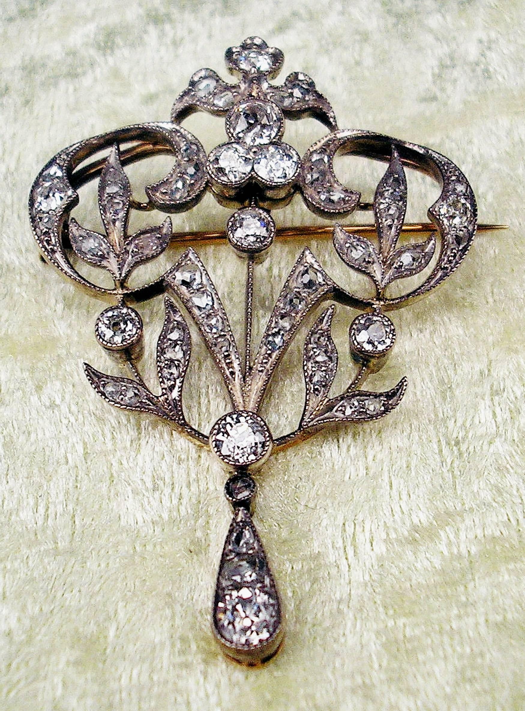 Made circa 1900

Finest golden art nouveau brooch with various diamonds (vintage cuts / 2.0 carat).
This piece of jewellery is of most elegant appearance - it is excellently shaped: the brooch consists of various stylized leaves connected to each