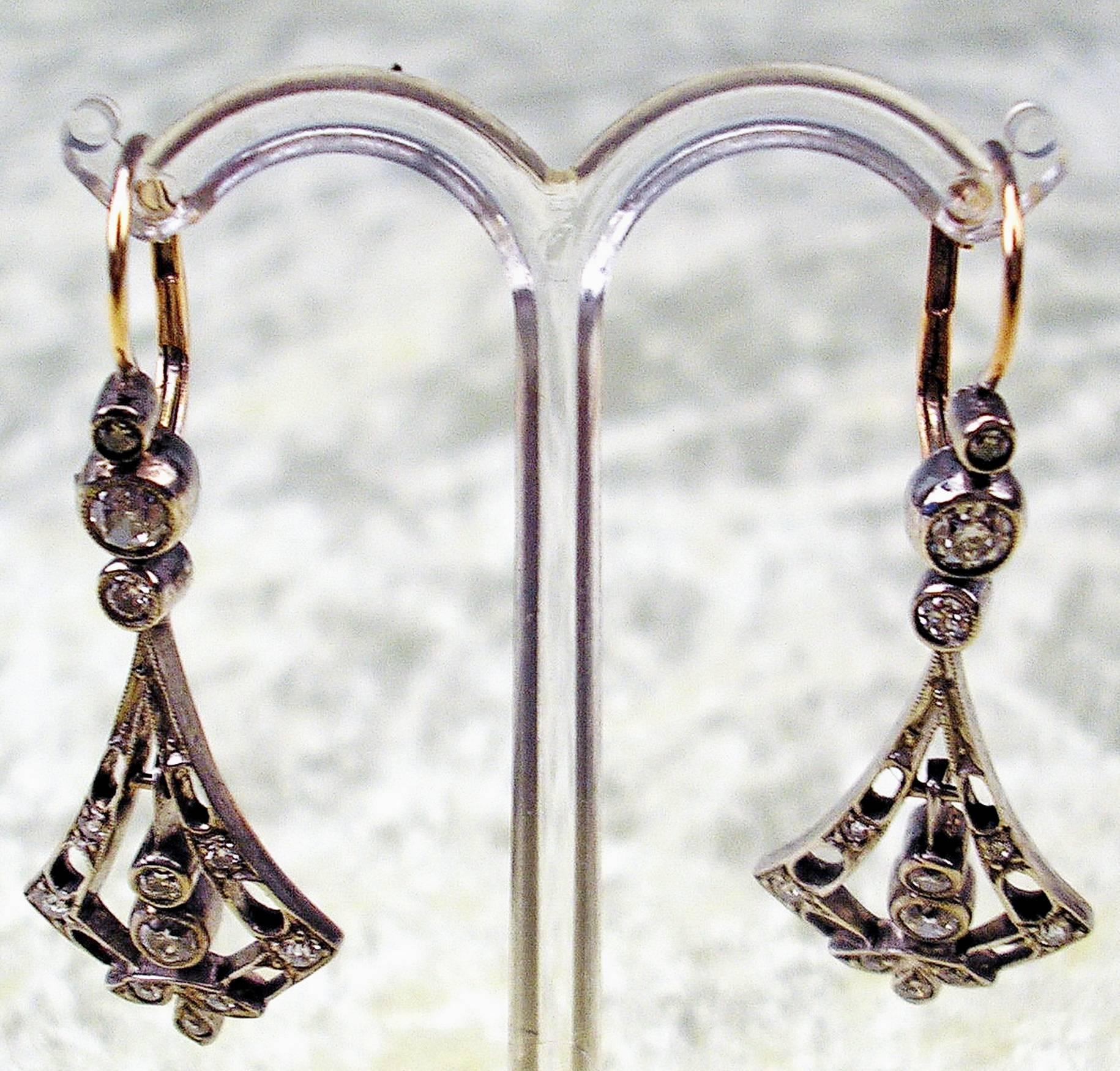 Golden art nouveau pair of eardrops of high value with many diamonds (vintage cuts / 1.00 carat) 

White gold ( 14 ct  585)  diamonds (vintage cuts / 1.00 carat)
Hallmarked 14 ct gold  old austrian mark: austrian (viennese)