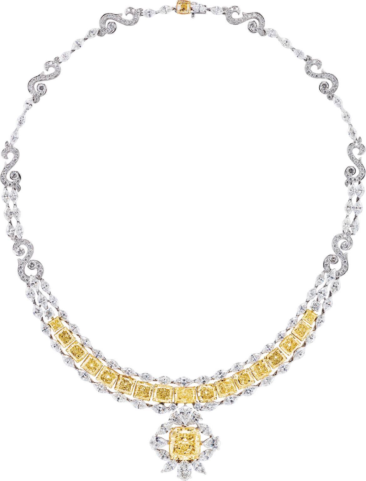 Centers an 8.12 carat brilliant-cut Fancy Yellow Diamond of “VVS1” clarity, and contains another 19.63 carats of radiant-cut Fancy Yellow Diamonds that range from “VVS1-VS2” clarity.

Necklace also contains 24.06 carats of white diamonds, their cuts