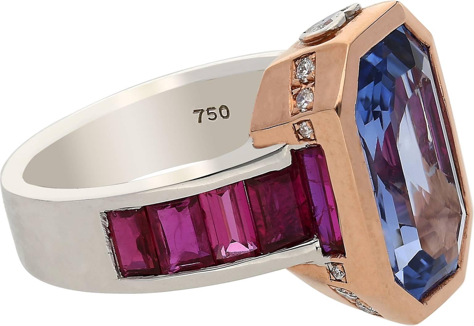 6.79 carat emerald cut ceylon Sri-Lanka Unheated Sapphire.
10.13 carat total weight.
3.06 carat Rubies.
0.28 carats of Diamonds.
GRS Certified.
GRS determined that Sapphire displays no signs of thermal treatment.
Set in 18k white and rose gold.