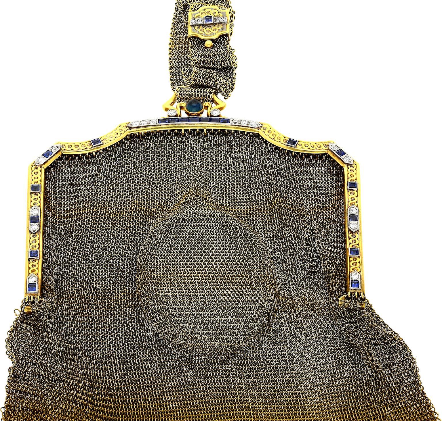 Woven Mesh Bag set in 14k Yellow Gold and Platinum.
Accented by French-cut Diamonds and step-cut/cabuchon Sapphires
Art Deco Era with Powder Mirror. Mesh strap. 