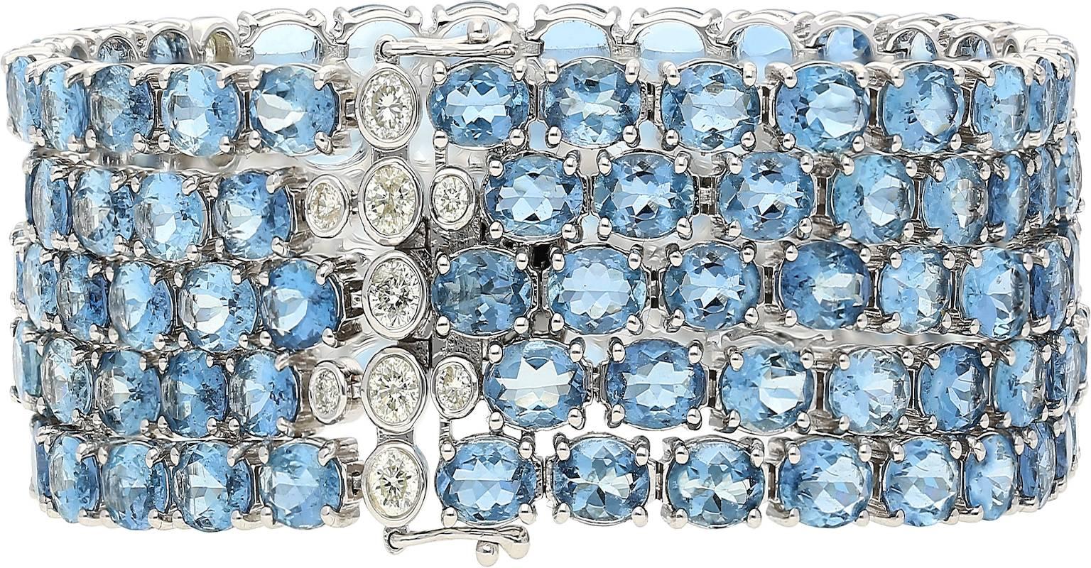 Set in 18k White Gold.
Totaling 129 oval-cut Aquamarine's (49.28 carats) and 27 round-brilliant cut Diamonds (1.84 carats)