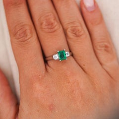 1/2 Carat Emerald and Baguette Diamond 3 Stone Platinum Ring