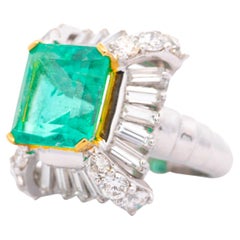GRS Certified 6.78 Carat Colombian Emerald & Baguette Diamond Platinum Ring