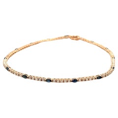 18k Rose Gold Round Cut Diamond and Marquise Cut Blue Sapphire Tennis Bracelet