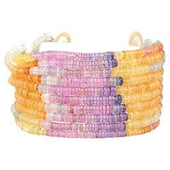 Pulsera de cuentas de zafiro multicolor y diamantes en oro amarillo de 18 quilates de diseño