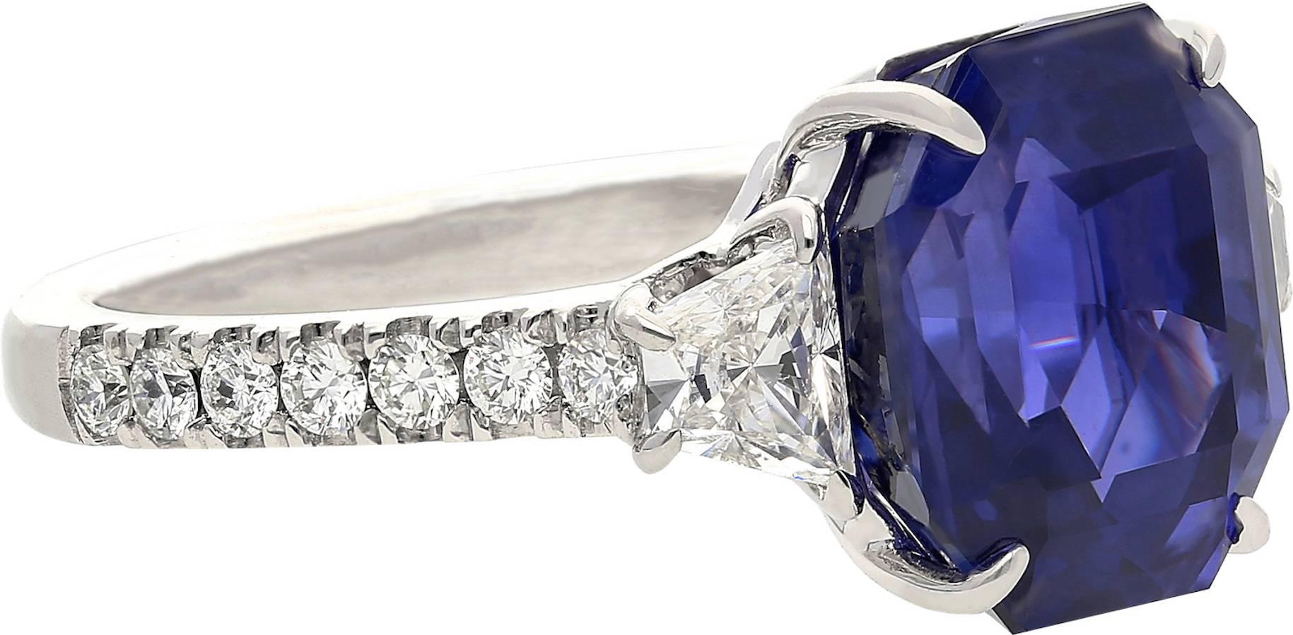 Set in 18k White Gold.
Certified by SSEF to be of Sri-Lanka origin,  Emerald-Cut, and free of thermal enhancement (unheated). 
Total weight 8.17 carats (0.98 carat diamond weight)
The Sapphire is classified as a "color-change" sapphire,