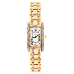 Montre Cartier Tank Américaine Quartz lunette diamants or 18K