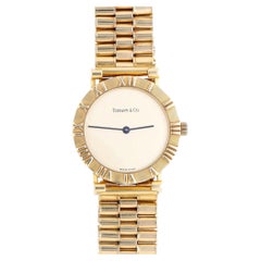 Tiffany & Co Atlas 18K Gold 31mm Cream Dial Quartz 3 Row Bracelet Watch