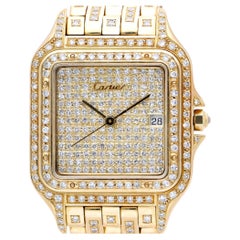 Ensemble montre Cartier Panthère, réf. 8839, modèle Jumbo 27 mm, entièrement sertie de diamants, en or jaune 18 carats