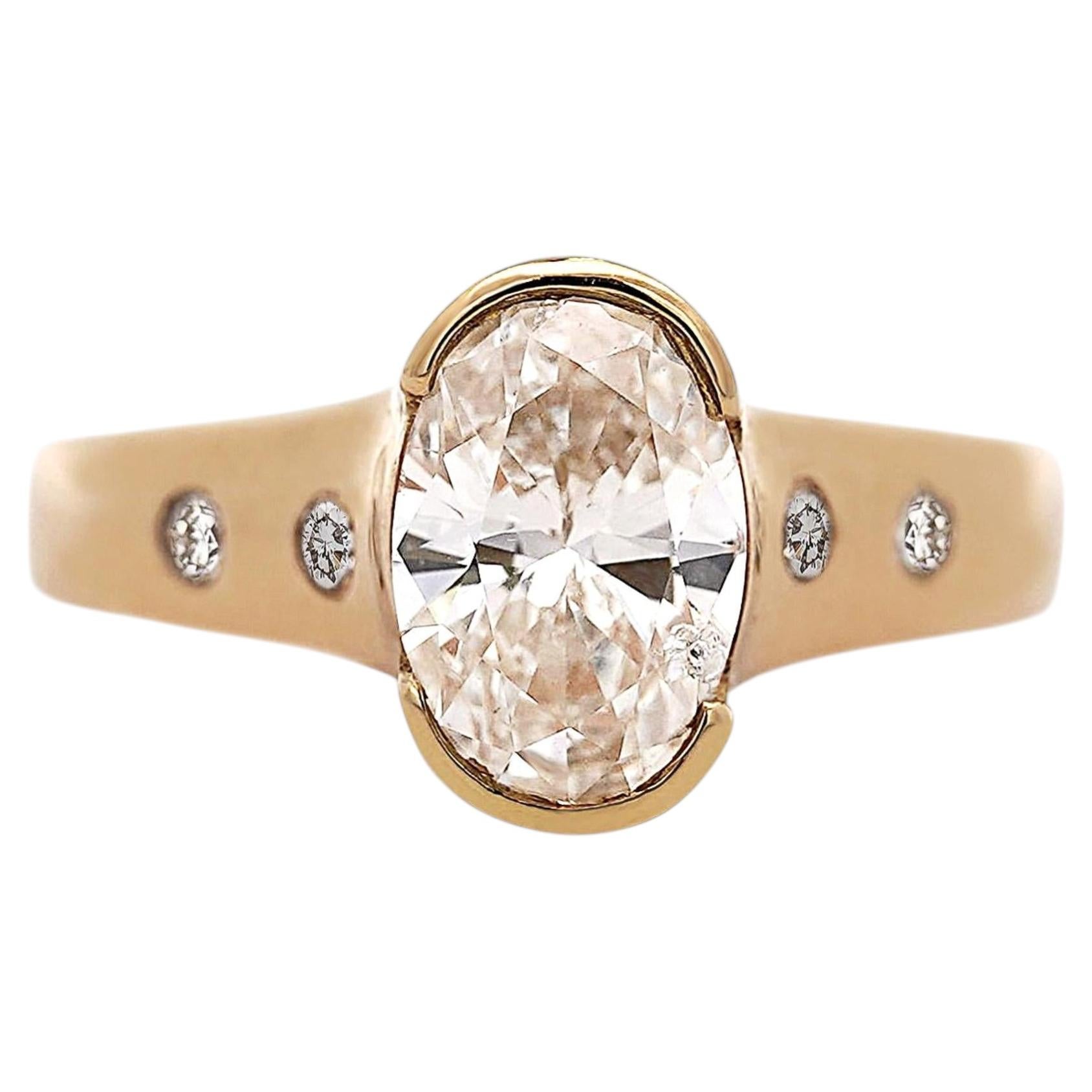 1.70 Carat J/I1 Oval Diamond and Floating Diamond Shank Engagement Ring For Sale