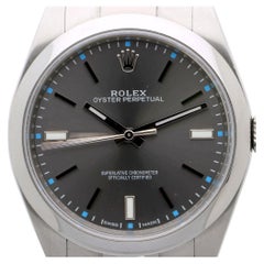 Montre Rolex Oyster Perpetual 114300, cadran rhodié, 39 mm, acier inoxydable, ensemble complet