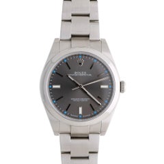 Montre Rolex Oyster Perpetual 114300, cadran rhodié, 39 mm, acier inoxydable, ensemble complet