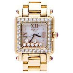 Reloj Chopard Happy Sport 27/6851-21/11 con diamantes y rubíes, de oro rosa de 18 quilates, con engaste completo