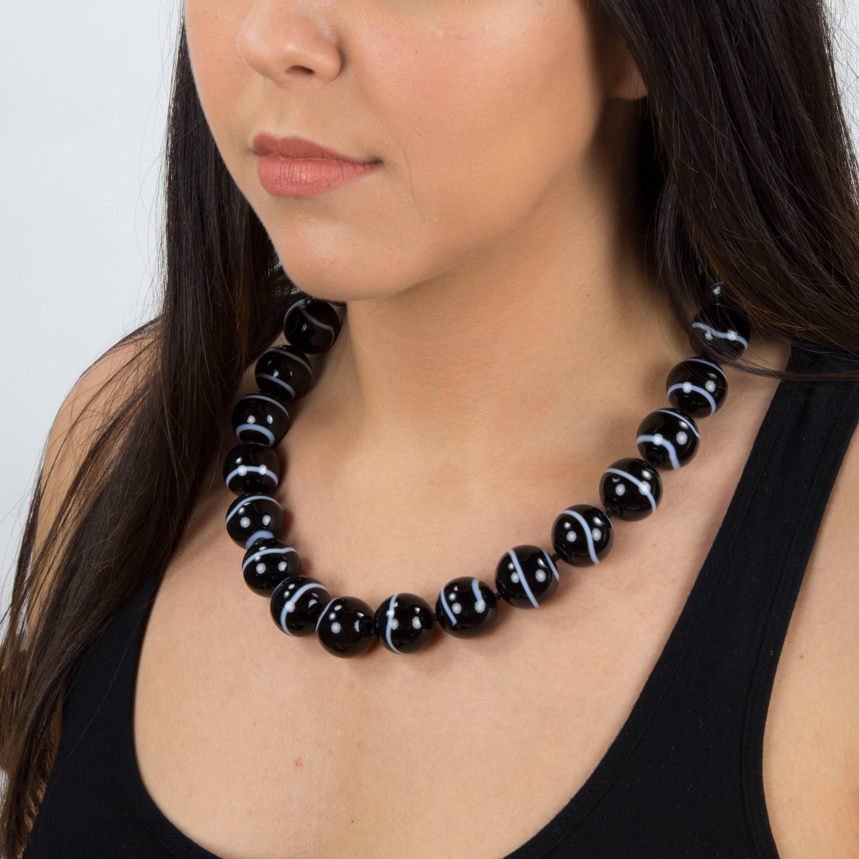 Stunning Large Banded Agate Bead Necklace comprising twenty-four 19.55mm beads; held by a unique bold sterling silver clasp; newly hand knotted with silk cord; Classic and Dynamic…illuminating your look with Timeless Beauty!   
