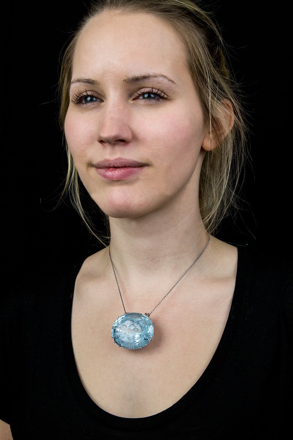 260 Carat Engraved Oval Blue Topaz Pendant 1
