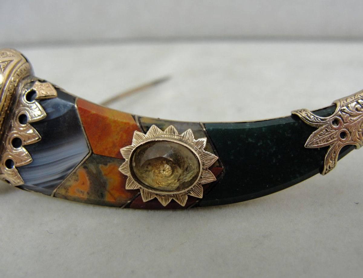 Finding Scottish Agate Victorian jewelry in gold is always special. This is a Beautiful Rare 9ct gold Victorian Scottish agate horn pin with a citrine collet set in the pin's middle and a citrine at the end. Spectacular hand engraved etching is with