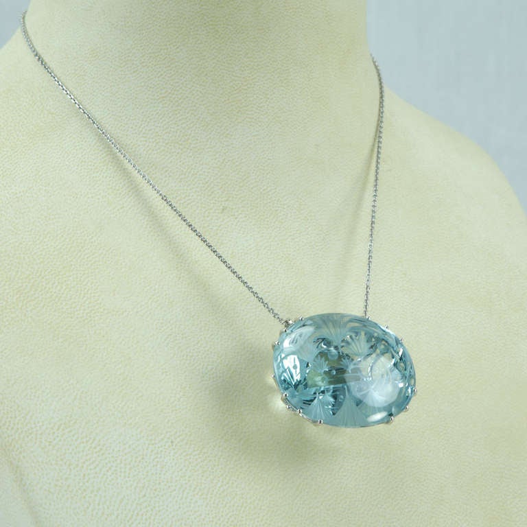 Women's 260 Carat Engraved Oval Blue Topaz Pendant