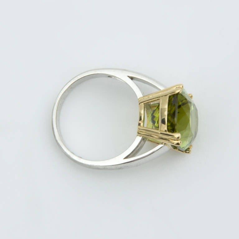 Beautiful 10.8 Ct Facet-cut Green Tourmaline Ring mounted in a handmade 14k yellow gold gallery setting and white gold shank; ring size 7. Classic and Timeless!