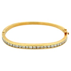 Bracciale rigido vintage in oro con diamanti incastonati a canale alternato – Gioielli di pregio di seconda mano