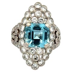 Vintage 4.07 Carat Asscher Aquamarine Gemstone and RBC Diamond Gold Navette Ring